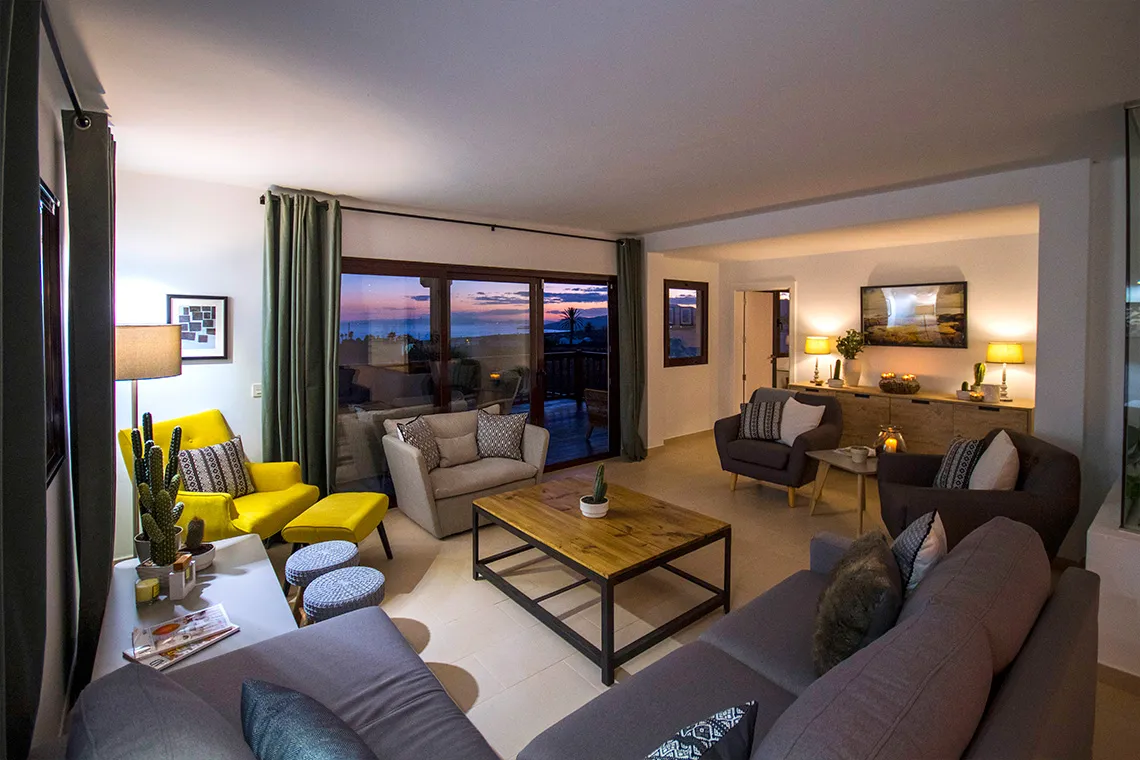 The open-plan living room on the first floor, at dusk